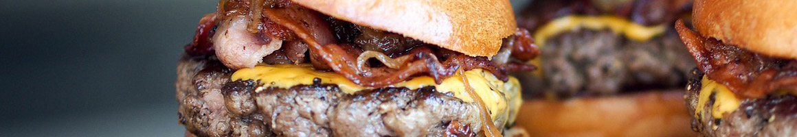 Eating American (New) Burger Hot Dog at Diesel and Duke restaurant in New Brunswick, NJ.
